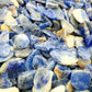 Top view of blue Sodalite polished chip, showing subtle veining, from Namibia.