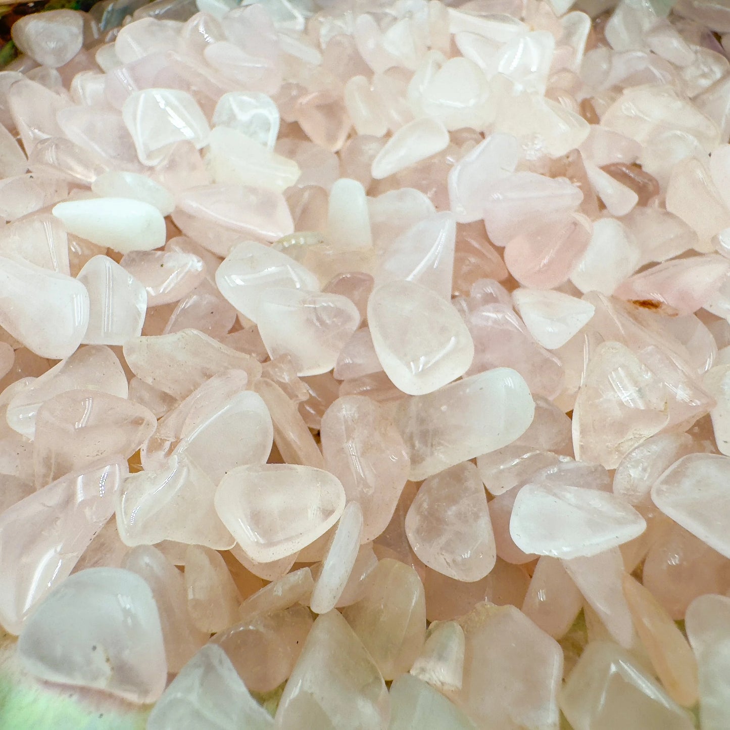 Detail of Rose Quartz polished chip, showing translucent edges.