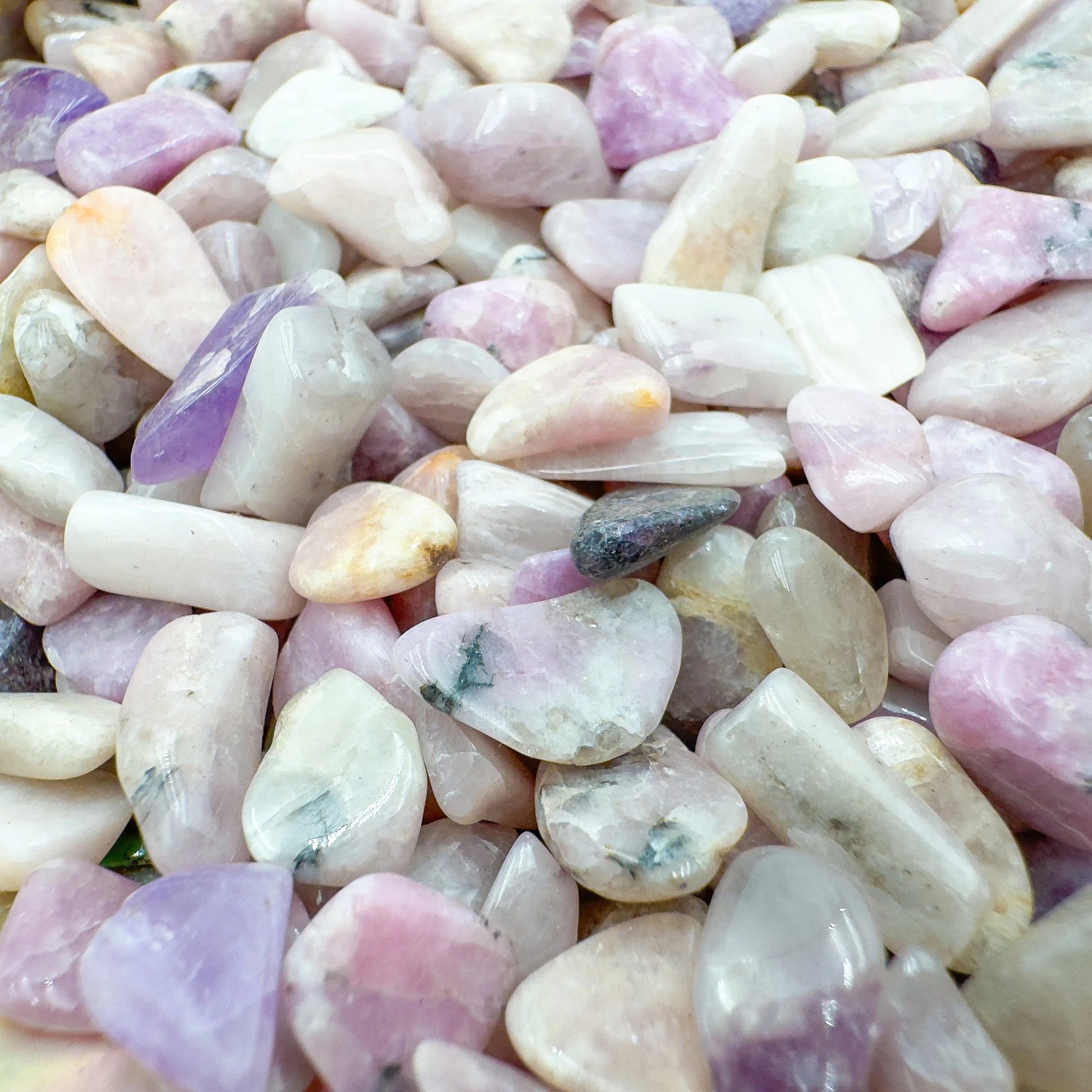 Magnified detail of purple Lepidolite polished chip, sourced from Namibia, worked with for Stress Relief.