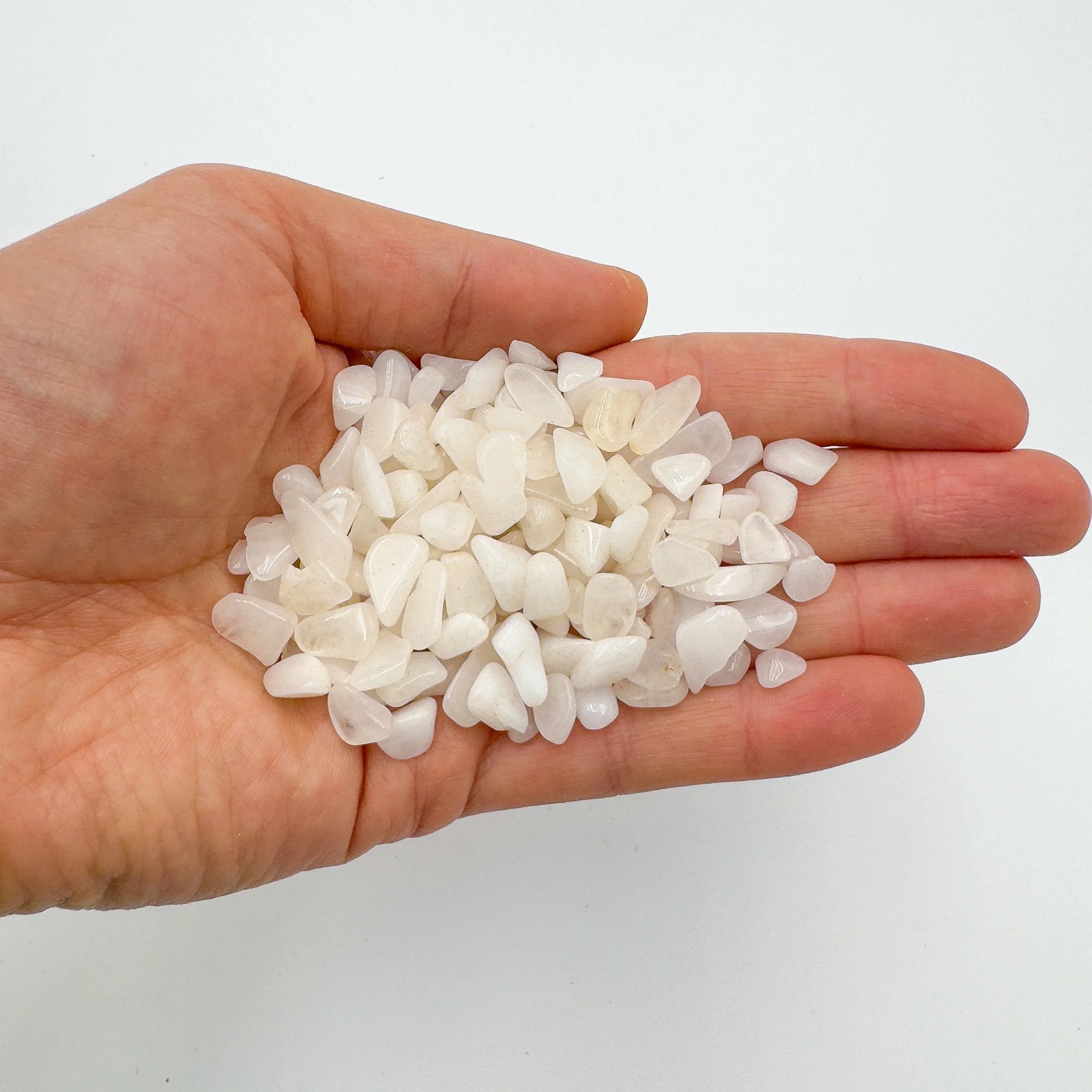 Alternate angle of Grade A Snow Quartz crystal chips showing overall shape