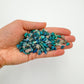 Bottom side of Grade A blue Chrysocolla polished chip, Namibia-sourced, showing natural texture.