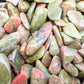 Top view of Grade A Unakite polished chip, showing subtle veining, associated with Emotional Healing.