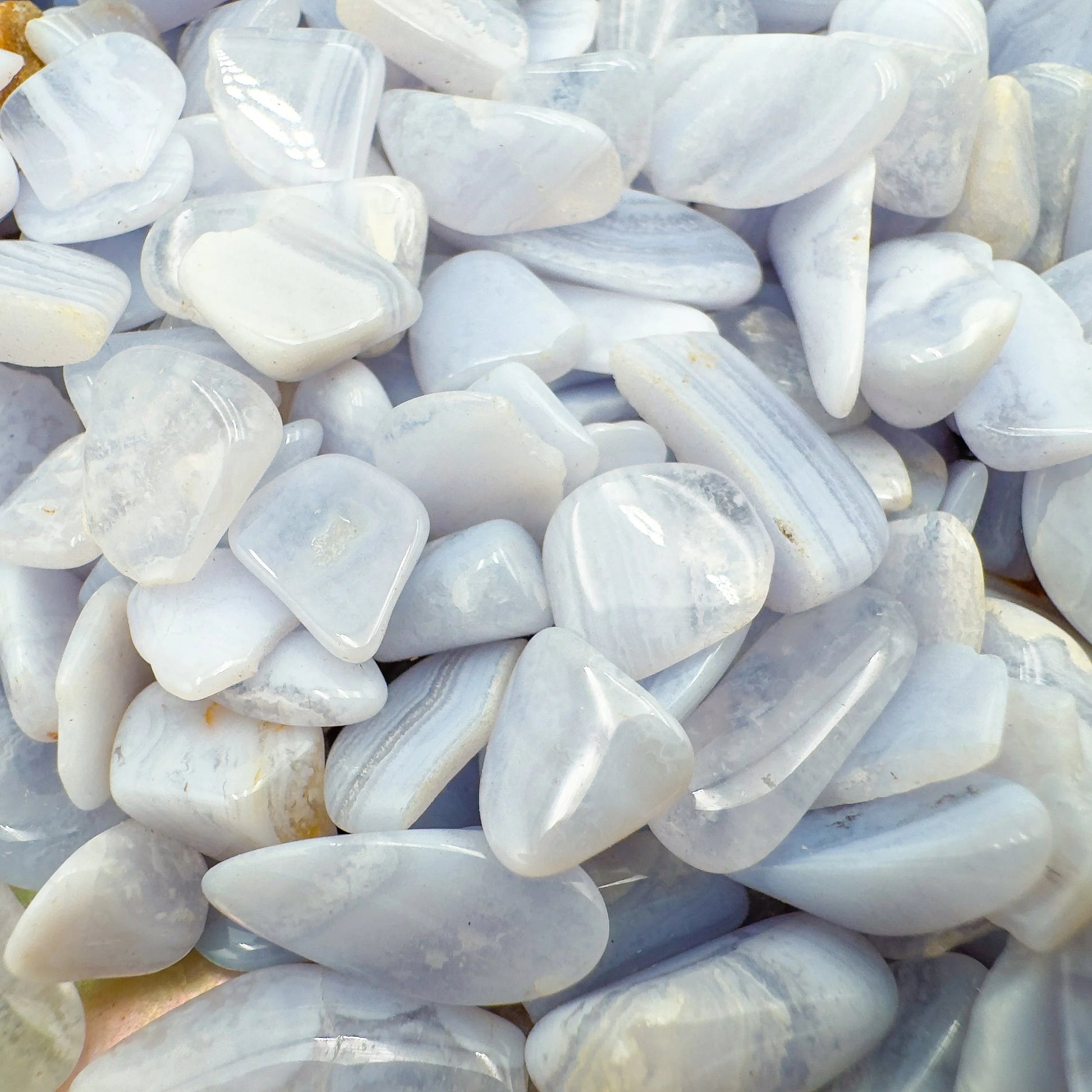 Color detail of Grade A Blue Lace Agate polished chip, turned to for Stress Relief and Emotional Healing.