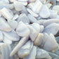 Side perspective of Blue Lace Agate polished chip, Namibia-sourced.