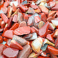 Detail of Grade A Red Jasper polished chip, showing translucent edges, from Northern Cape, South Africa.