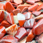 Side angle of Red Jasper polished chip, drawn on for Grounding and Energy.