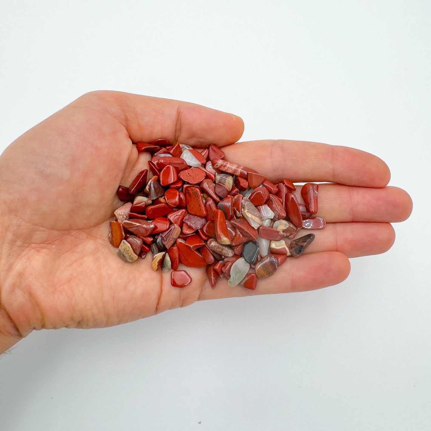 Reverse side of Red Jasper polished chip, showing natural variation, South Africa-sourced.