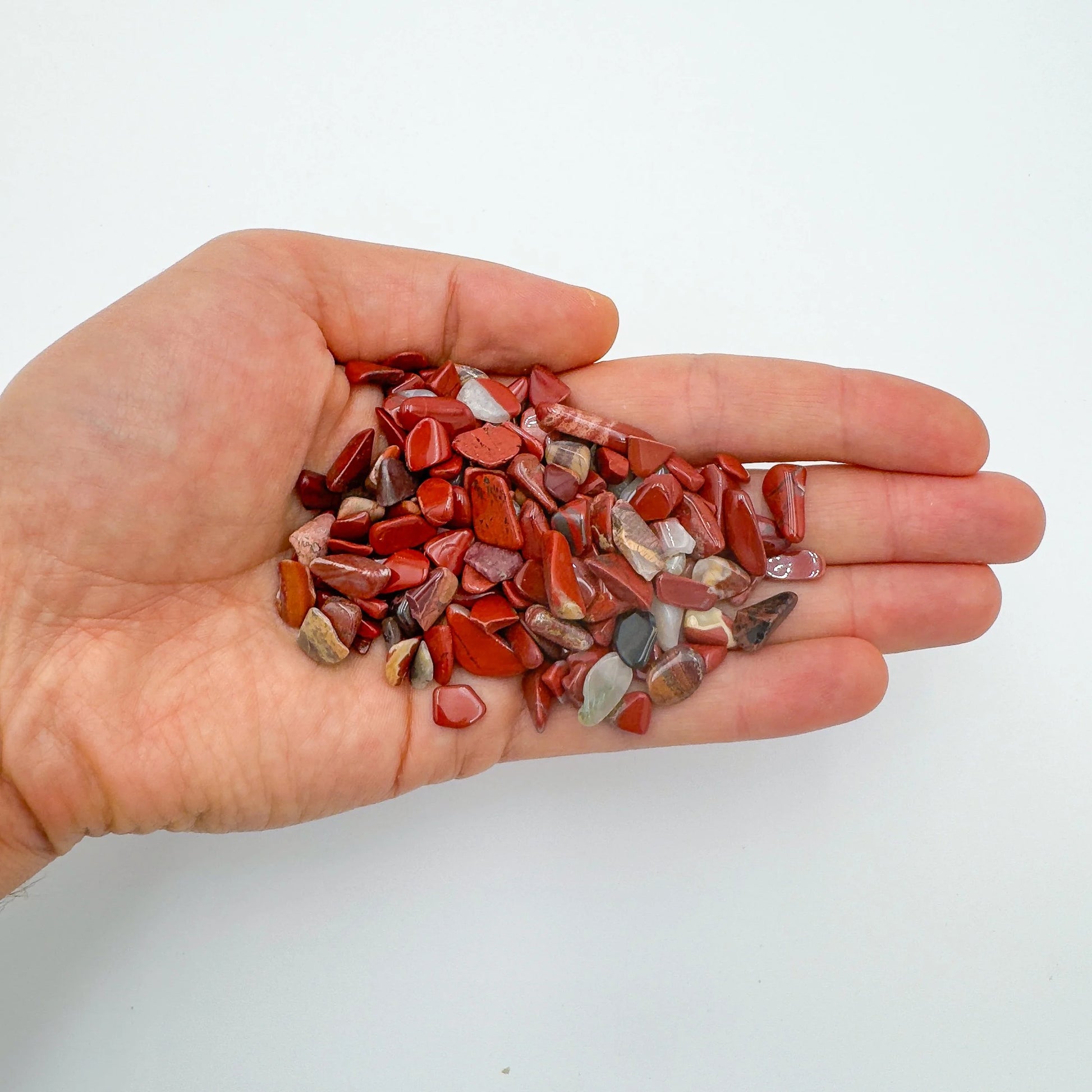 Reverse side of Red Jasper polished chip, showing natural variation, South Africa-sourced.