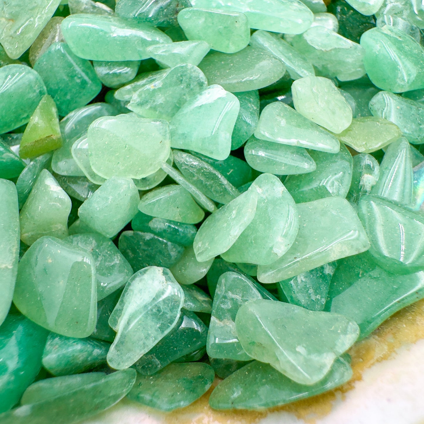 Profile shot of Grade A Aventurine polished chip, traditionally used for Luck.