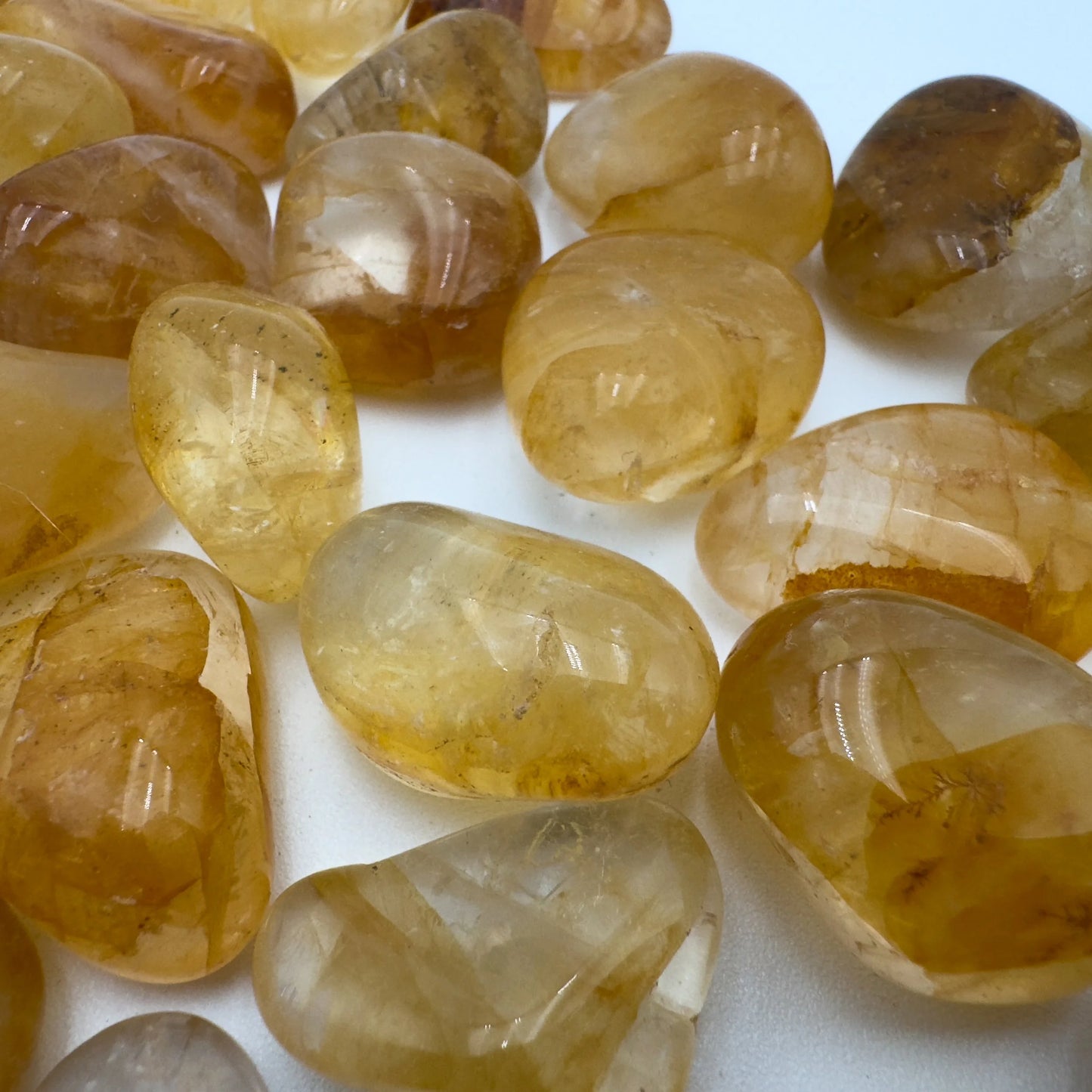 Detail capture of Golden Healer tumbled stone, linked to Healing and Meditation, sourced from Minas Gerais, Brazil.