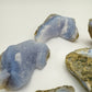 Palm-scale view of a Blue Lace Agate raw geode to support Stress Relief and Emotional Healing.