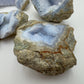 Overhead view of Blue Lace Agate raw geode, showing natural sheen.