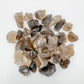 Close-up detail of Grade AA Smoky Quartz raw showing natural brown, gray tones and texture