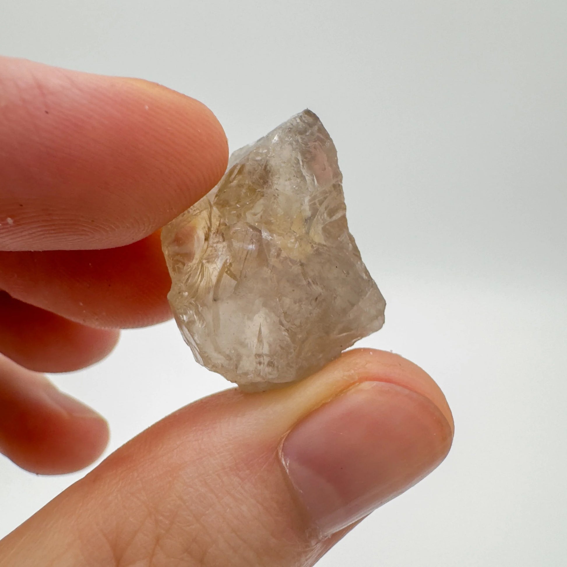 Back view of Grade AA Smoky Quartz raw showing natural surface