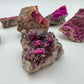 Texture-level view of Cobalt Calcite raw stone, kept near for Love, showing tight grain.