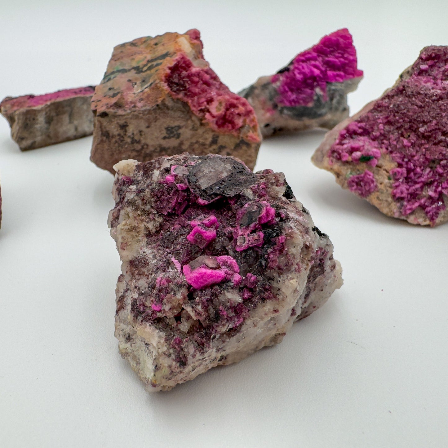 Texture-level view of Cobalt Calcite raw stone, kept near for Love, showing tight grain.
