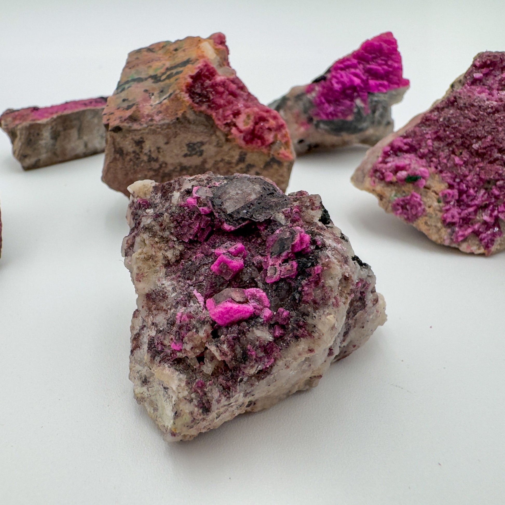 Texture-level view of Cobalt Calcite raw stone, kept near for Love, showing tight grain.