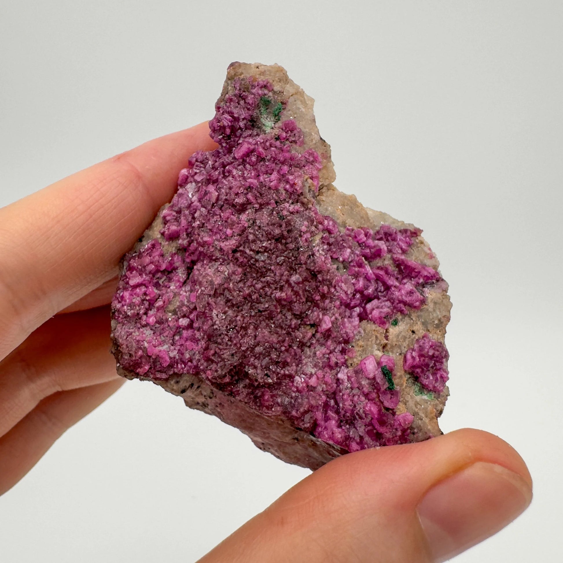 Back view of Grade AA Cobalt Calcite raw showing natural surface