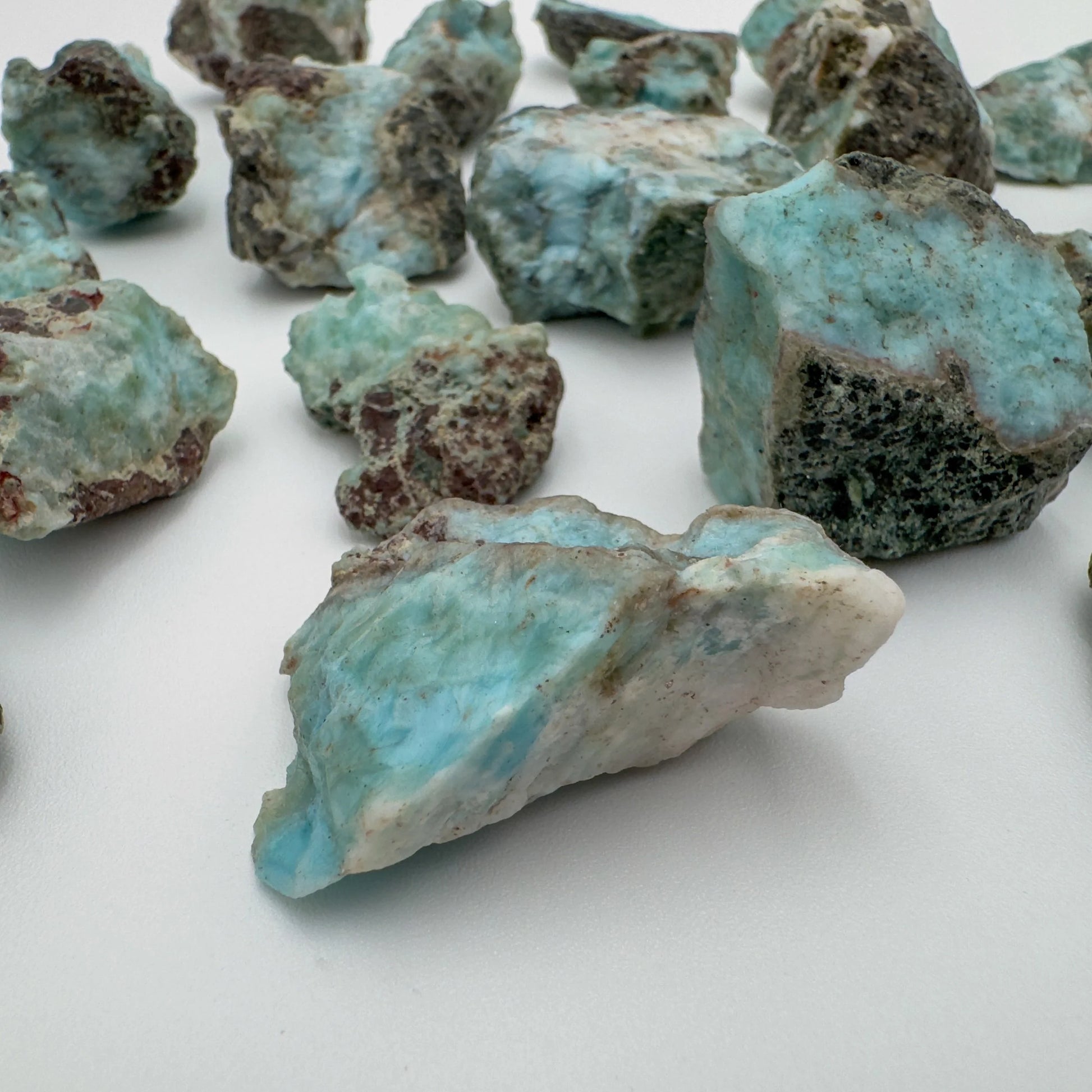 Close-up of Larimar raw stone from Dominican Republic, soothing wellness stone for Emotional Healing