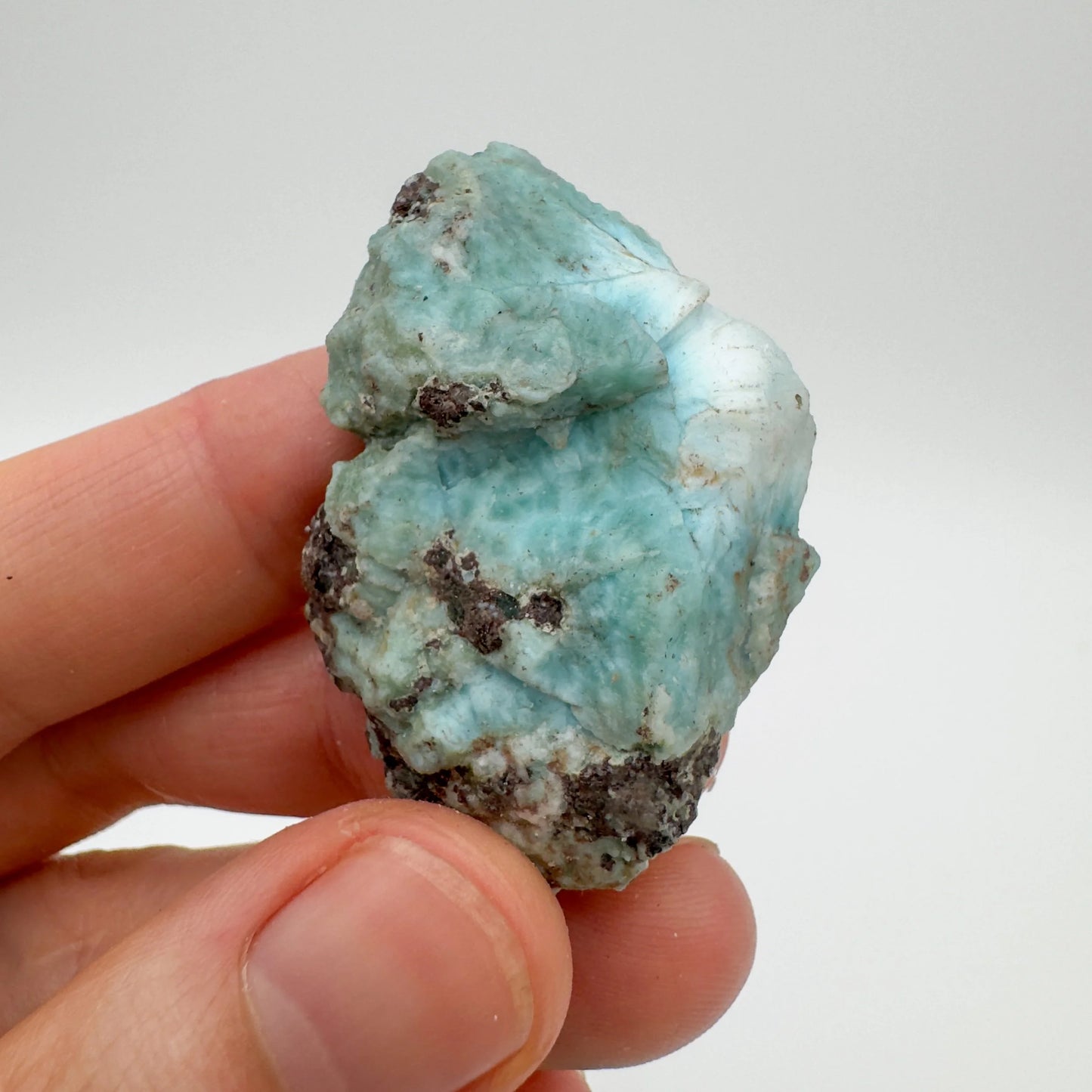 Handheld Larimar raw stone from Dominican Republic for meditation, Emotional Healing and Stress Relief