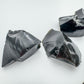 Aerial view of Black Obsidian raw stone, showing characteristic color, from Argentina.