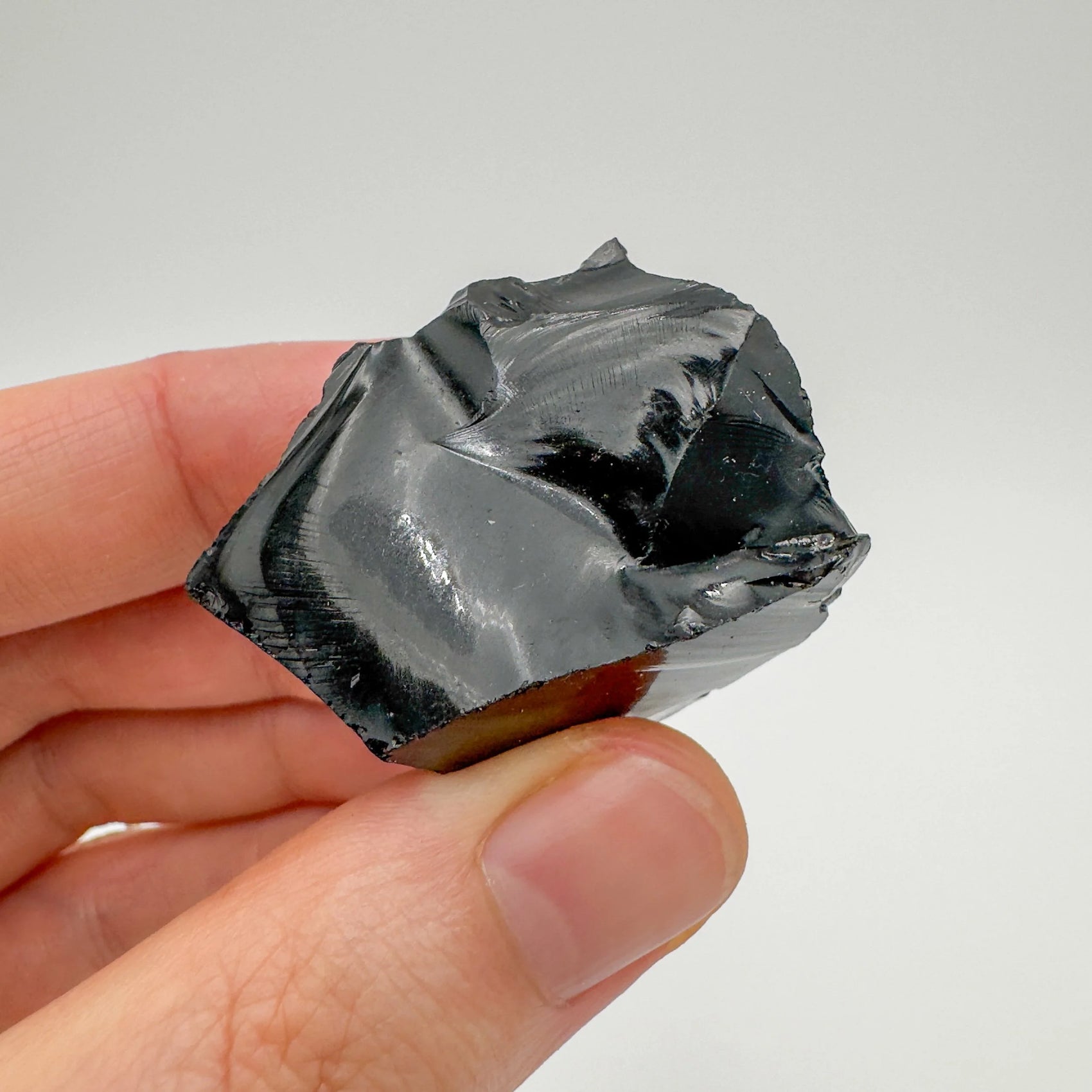 Handheld Black Obsidian raw stone from Argentina for meditation, Emotional Healing and Cleansing