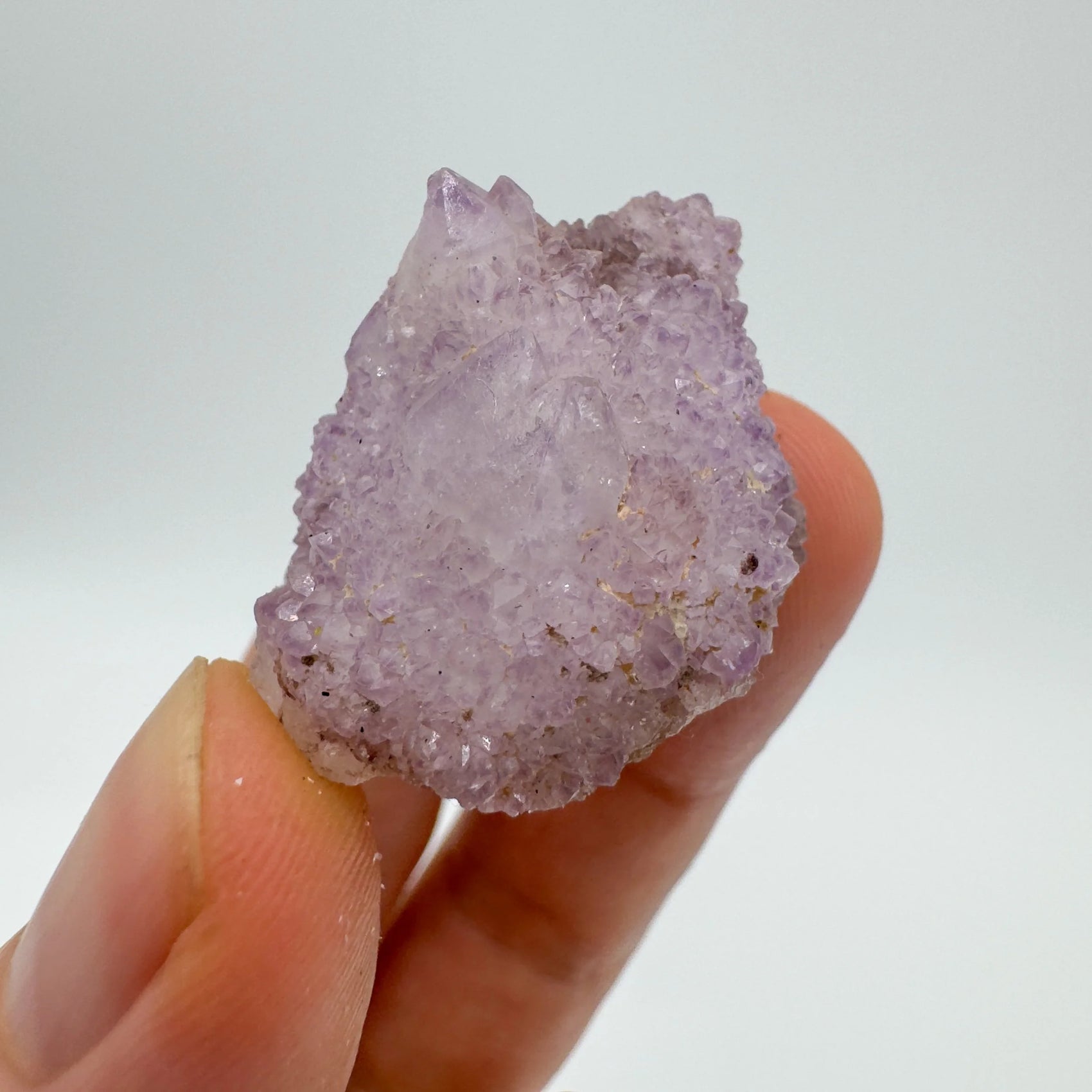 Top view of clear Quartz raw stone, showing natural patina.