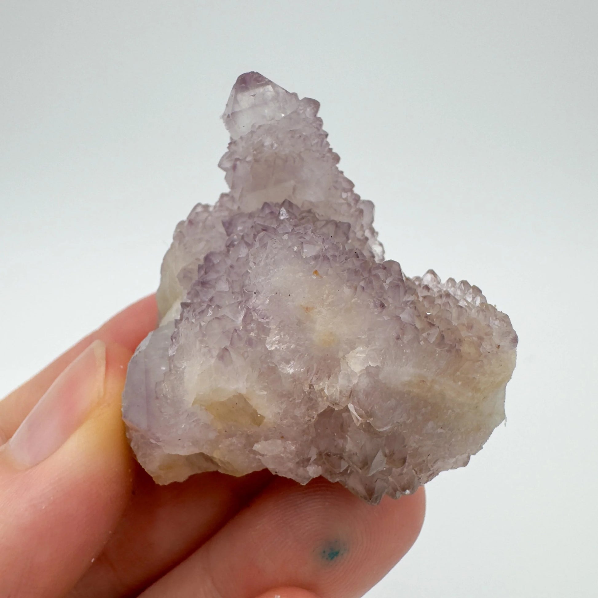Scale reference of one Quartz raw stone for scale, hand-selected from Mpumalanga, South Africa.