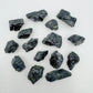 Side-on view of Grade A Black Tourmaline raw stone, showing characteristic patterning, from Minas Gerais, Brazil.