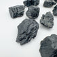 Scale reference of a Black Tourmaline raw stone, from Brazil.