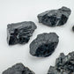 Alternate angle of Grade A Black Tourmaline raw showing overall shape