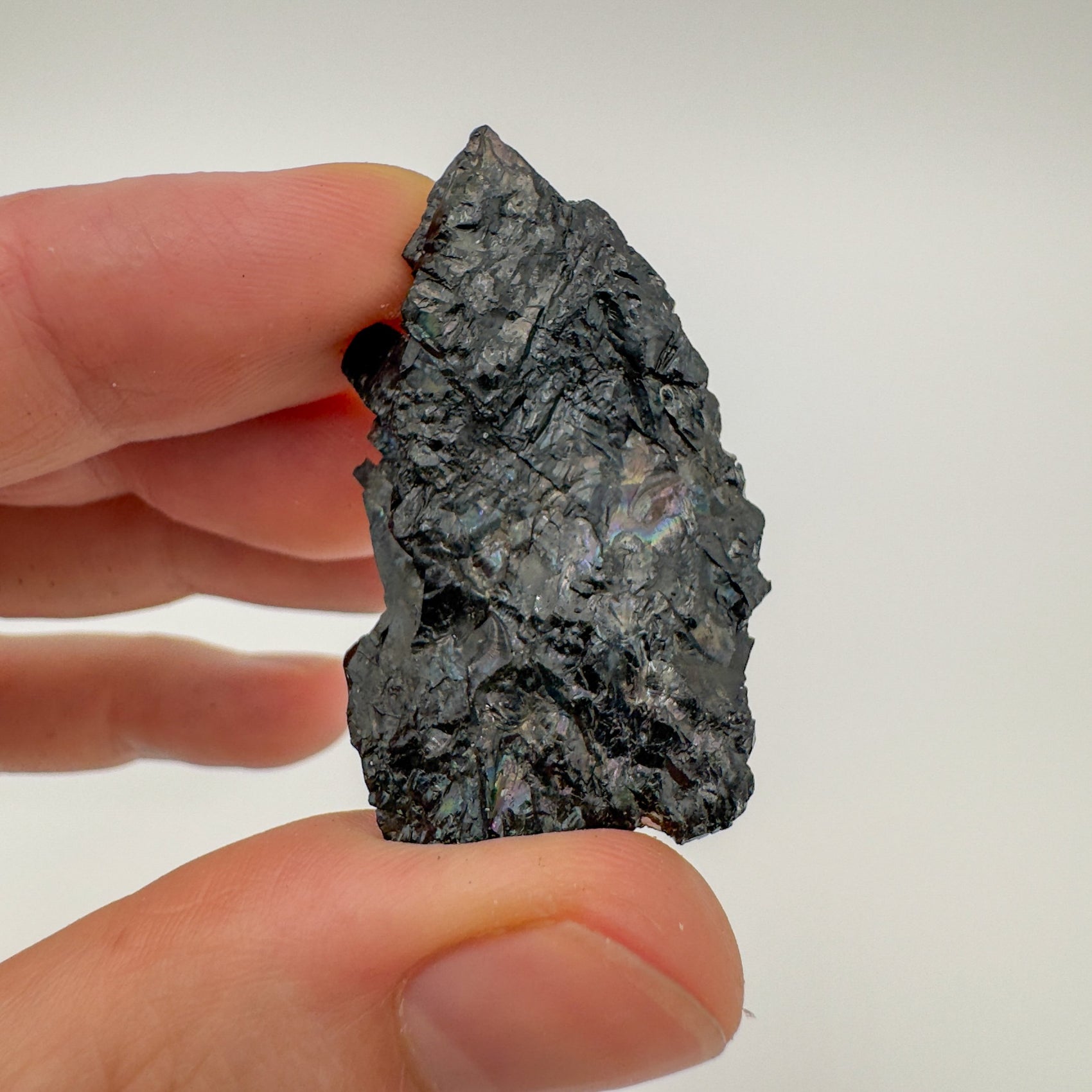 Close-up of Black Tourmaline raw crystal from Brazil, soothing wellness stone for Stress Relief