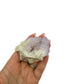 AA-grade cactus spirit quartz specimen from Mpumalanga South Africa, held in an open hand, showing true scale, 2.37 in L x 1.76 in W x 2.12 in H, 0.32 pounds, specimen 10.
