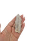 AA-grade cactus spirit quartz specimen from Mpumalanga South Africa, held in an open hand, showing true scale, 2.95 in L x 1.08 in W x 0.79 in H, 0.13 pounds, specimen 9.