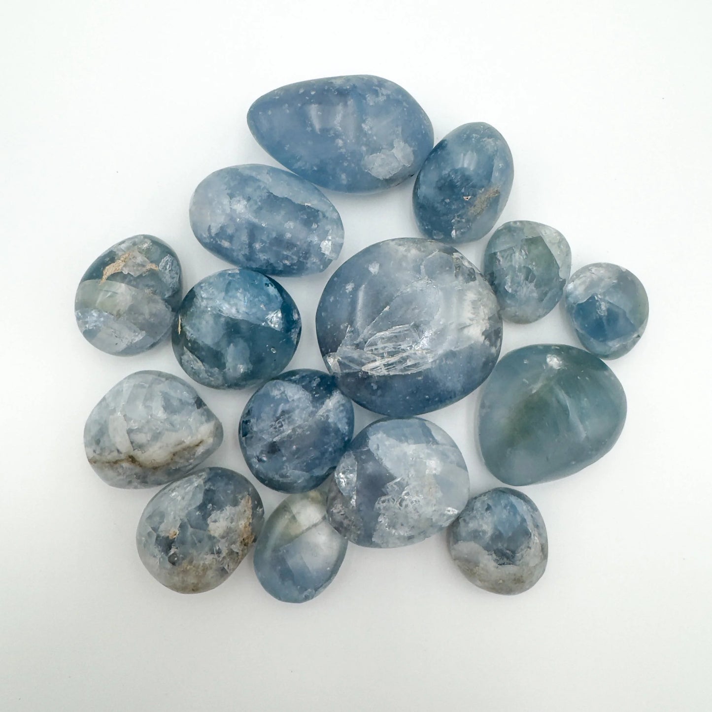 Close-up of Celestite palm stone from Madagascar, soothing wellness stone for Meditation