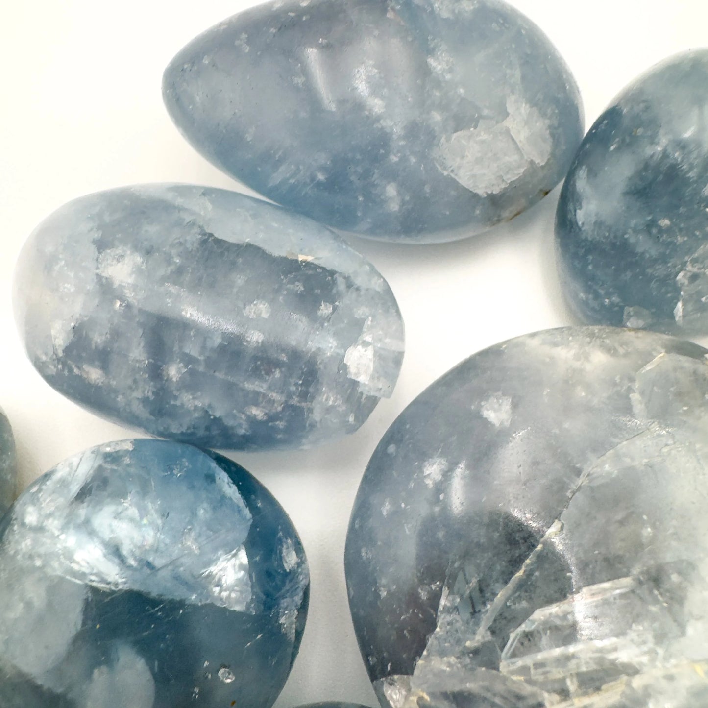 Celestite palm stone in Blue, Clear tones from Madagascar for Meditation and Stress Relief