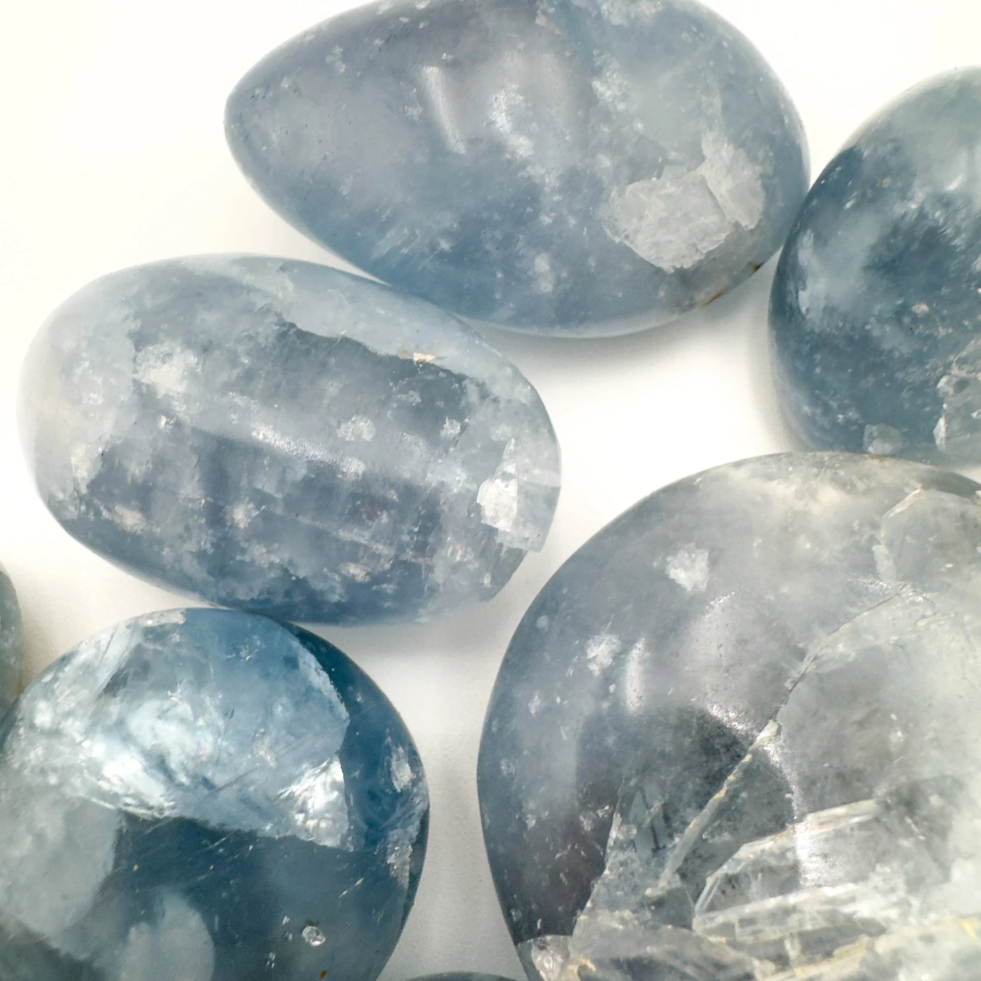 Celestite palm stone in Blue, Clear tones from Madagascar for Meditation and Stress Relief