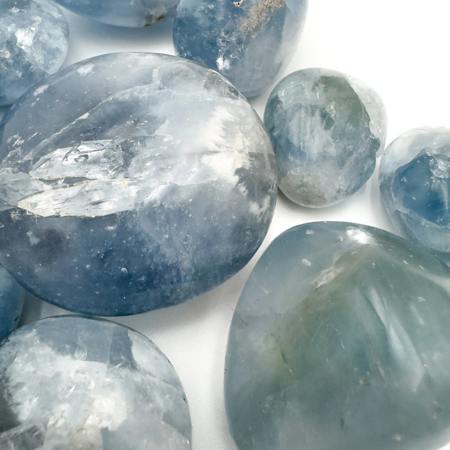 Close-up of Celestite palm stone from Madagascar, soothing wellness stone for Meditation