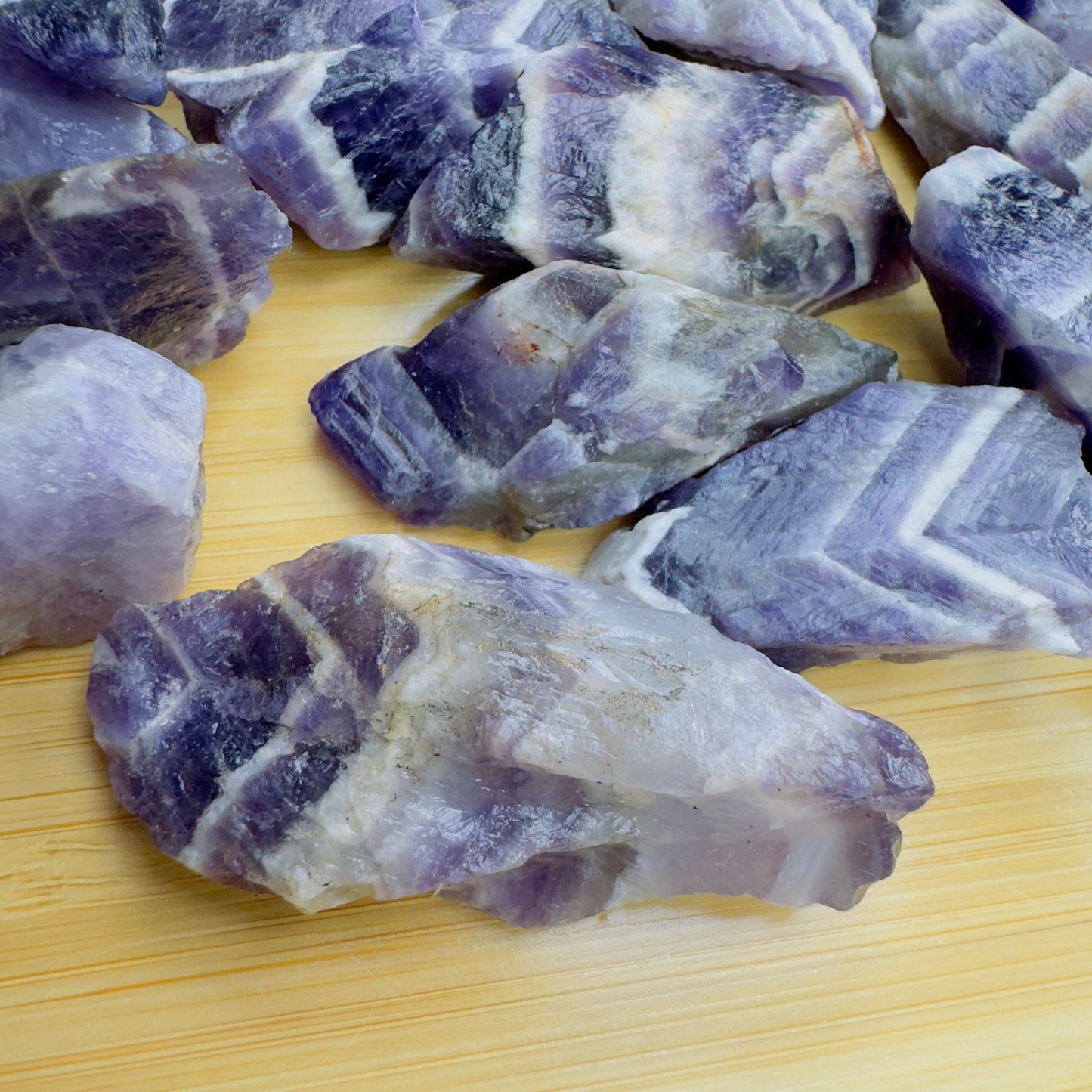 Profile view of Chevron Amethyst raw stone, often kept for Intuition, hand-selected from Copperbelt Province, Zambia.