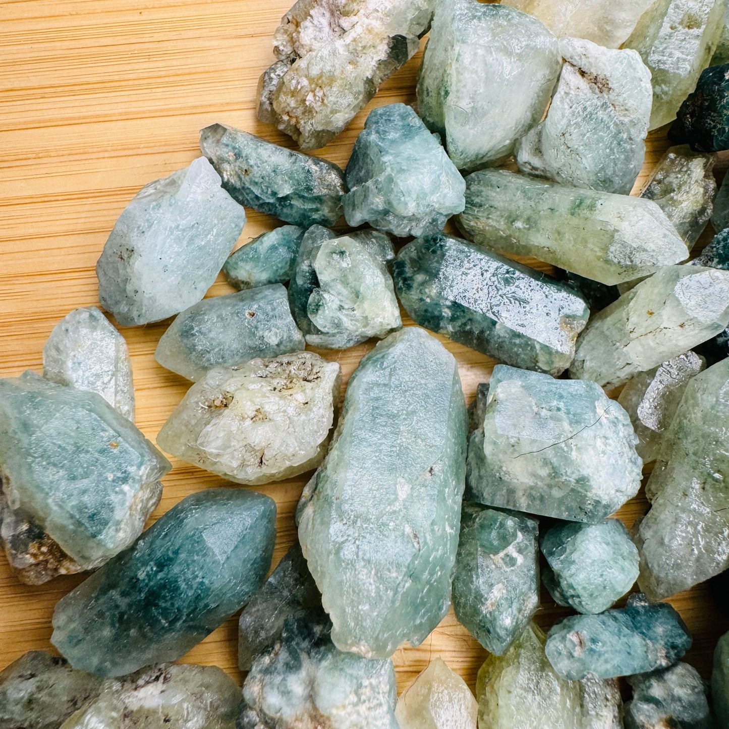 Hand-scale shot of a Chlorite Quartz raw point, sourced from Zimbabwe.