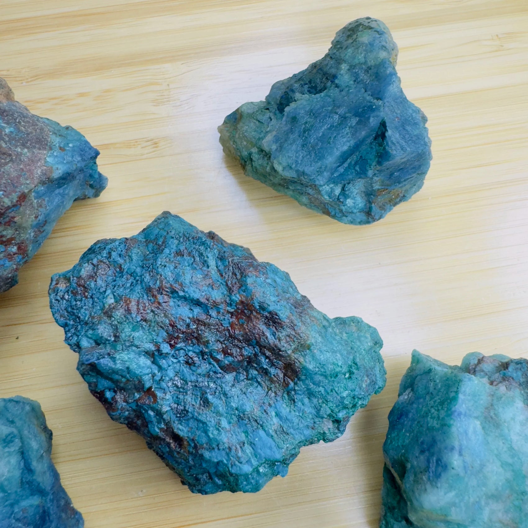 Reverse angle of Chrysocolla raw stone, from Namibia, traditionally used for Emotional Healing and Stress Relief.