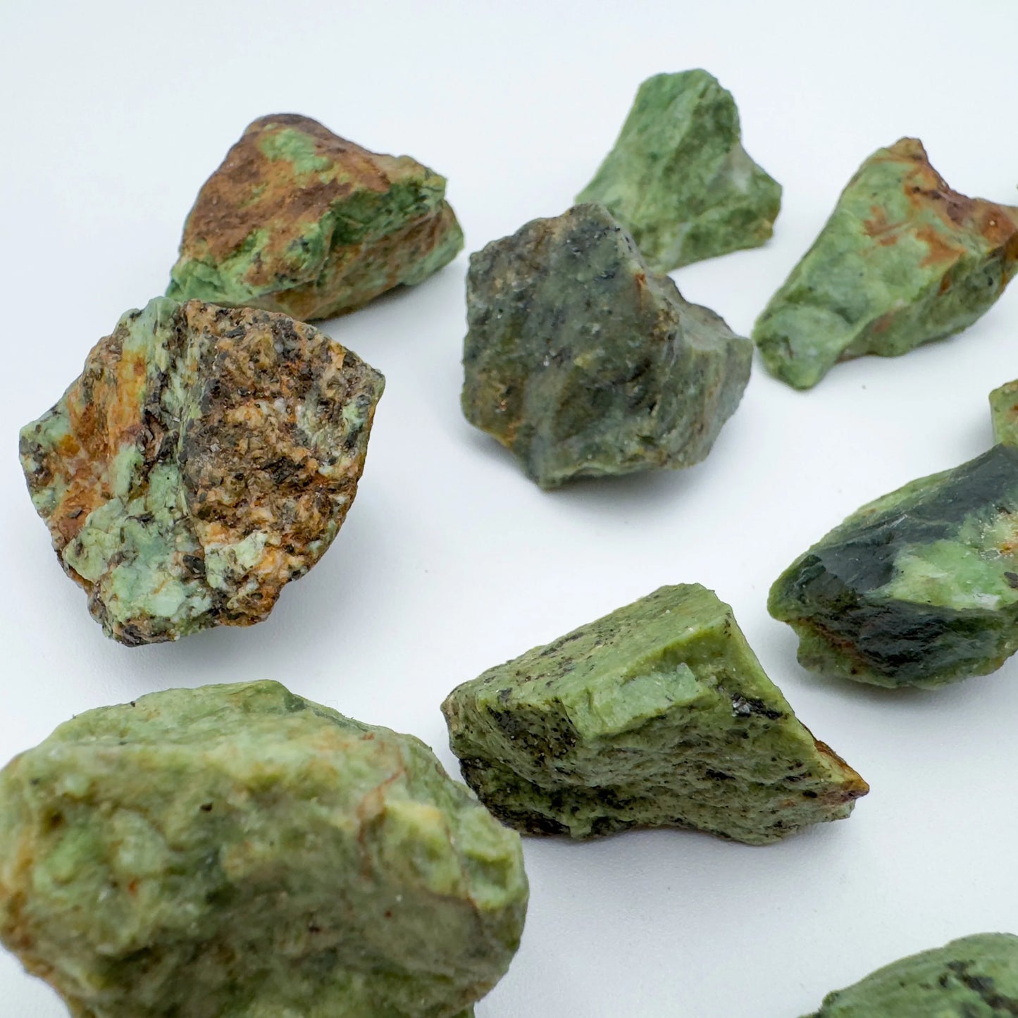 Plan view of Grade A Chrysoprase raw stone, often paired with practices around Love, showing earthy tone.