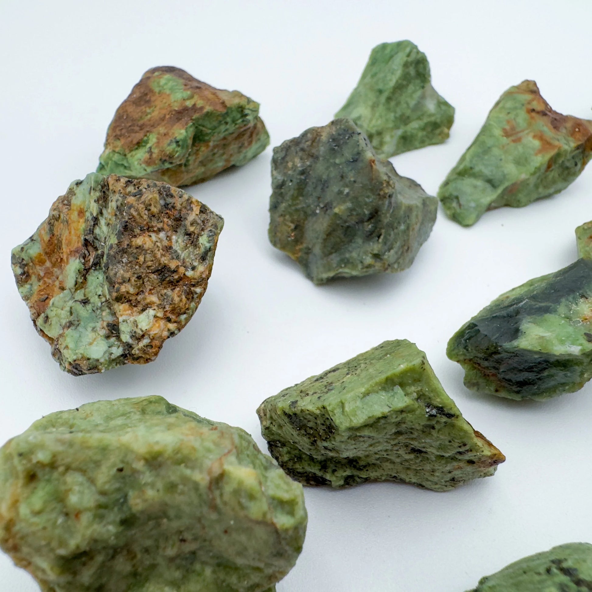 Plan view of Grade A Chrysoprase raw stone, often paired with practices around Love, showing earthy tone.