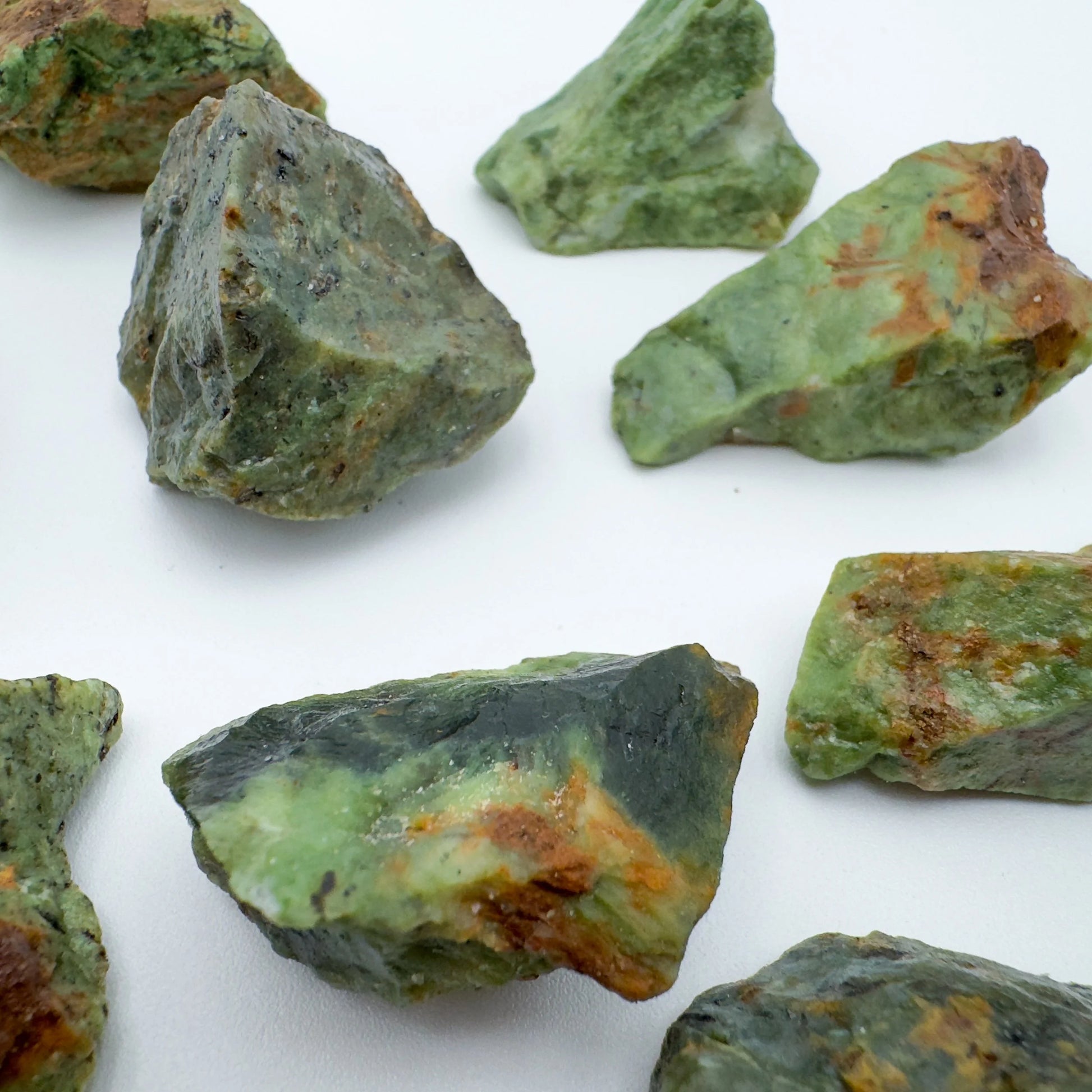 Underside view of Grade A Chrysoprase raw stone, showing open form, from Madagascar.
