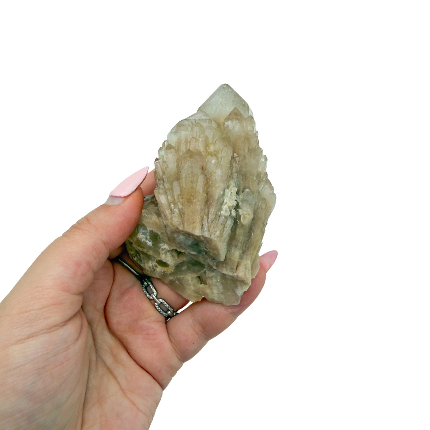 A hand holds citrine cluster no. 7 for scale, the 0.41 lb specimen sitting across the palm at 2.19 inches.