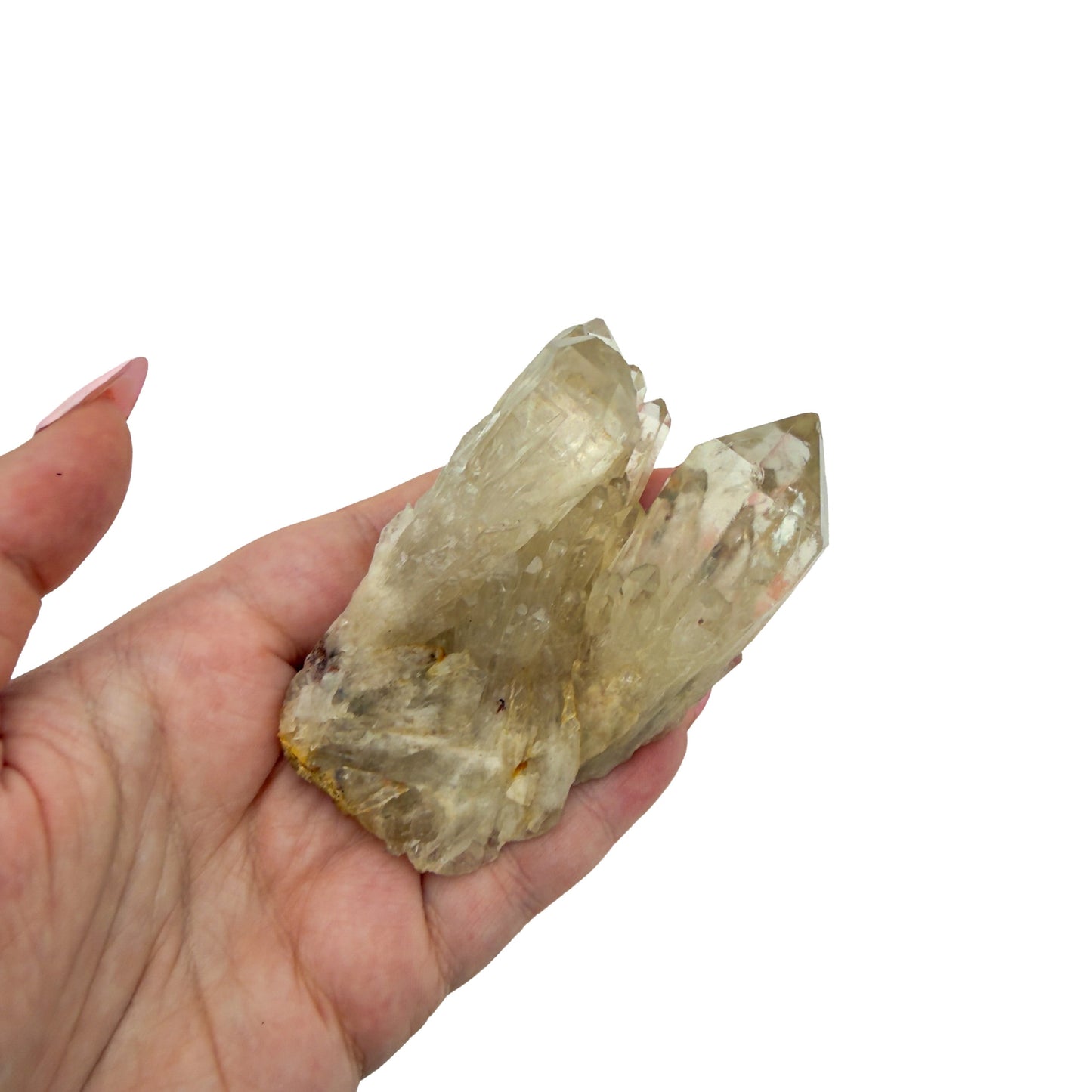 Scale reference for natural citrine no. 8: the 3.34 by 2.00 inch cluster resting in an open hand.