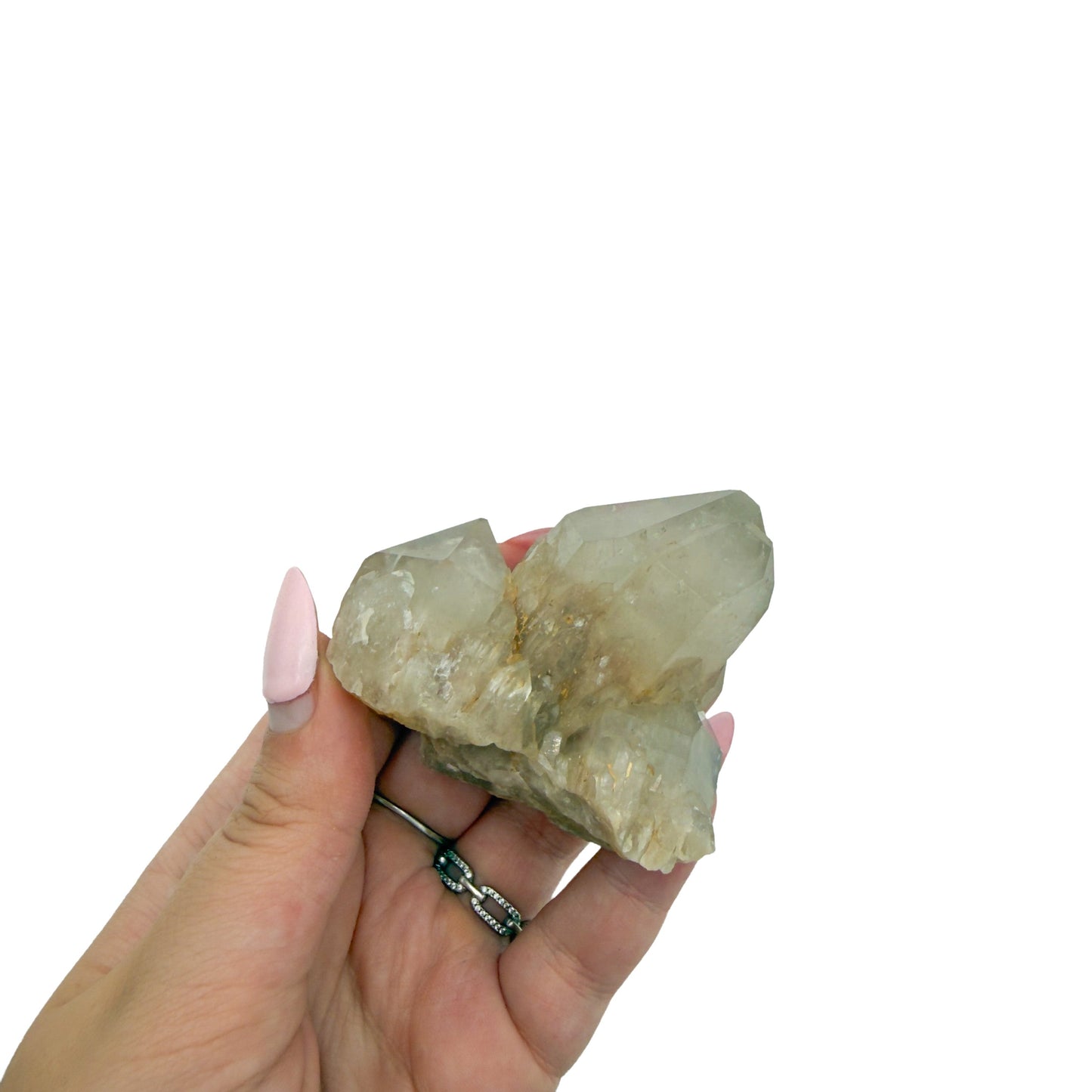 A hand holds citrine cluster no. 12 for scale, the 0.29 lb specimen sitting across the palm at 2.45 inches.