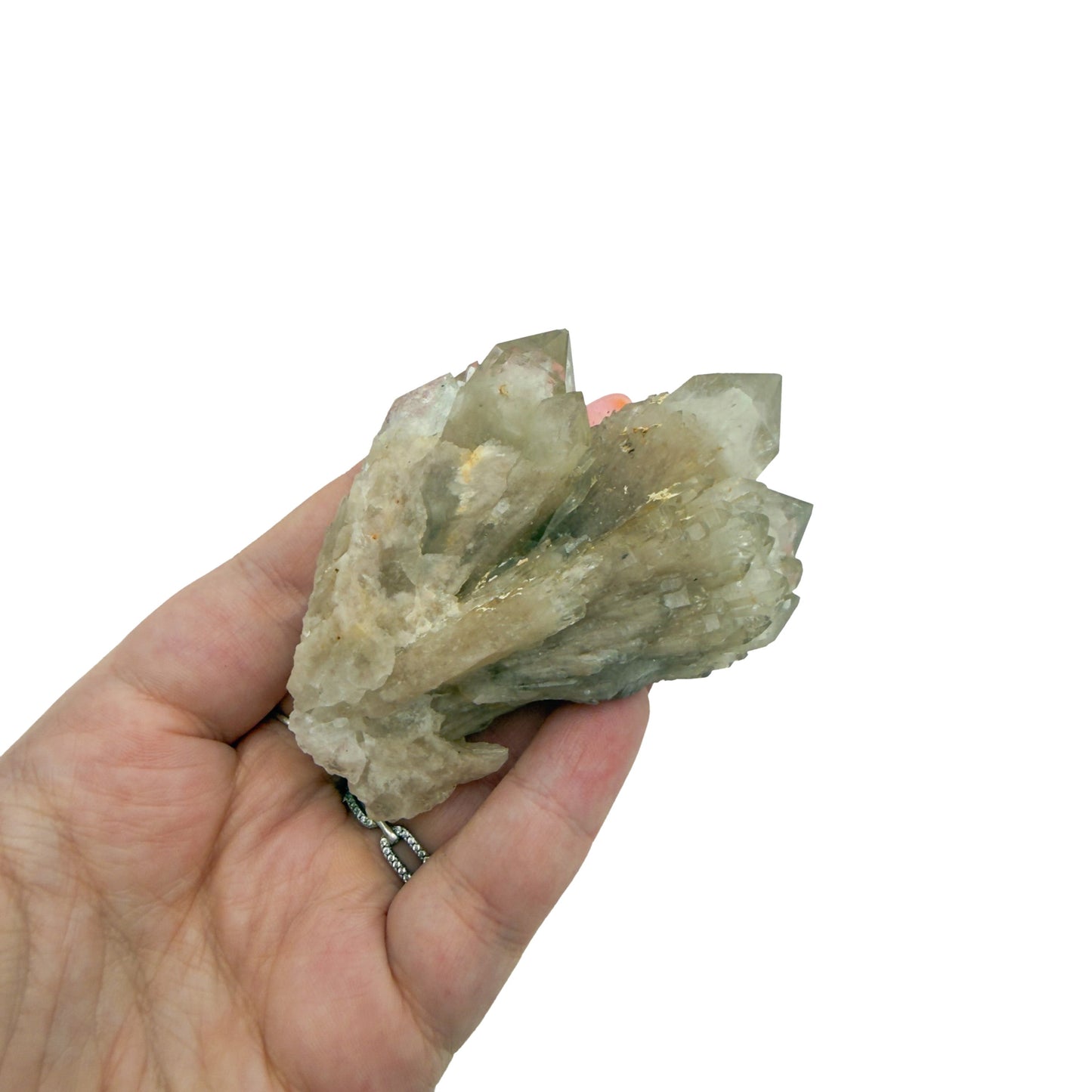 Citrine cluster no. 14 cupped in a hand, giving a sense of its 1.25 inch height and 0.27 pound weight.