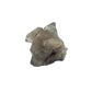 Angled three-quarter view of a 0.25 pound natural citrine cluster, no. 21, showing pale amber crystal faces over a raw base.