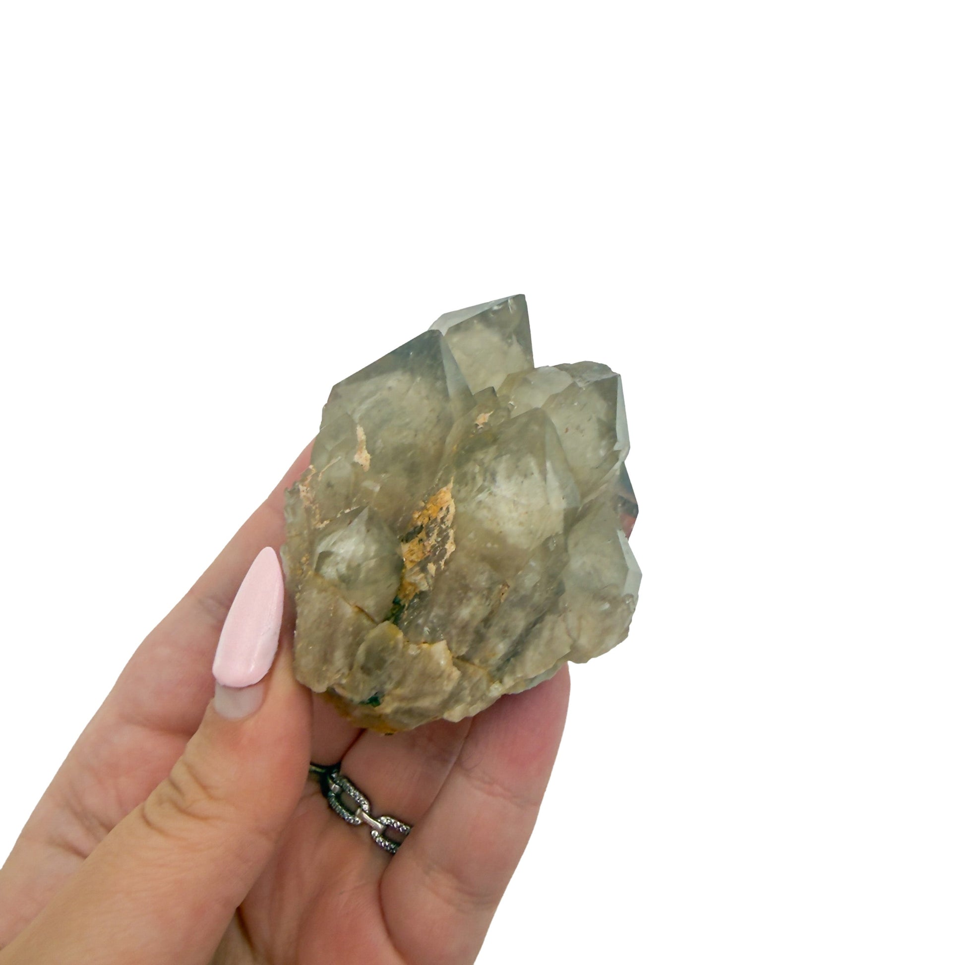 The 2.71 inch citrine cluster no. 25 shown in hand so its collector scale reads clearly.
